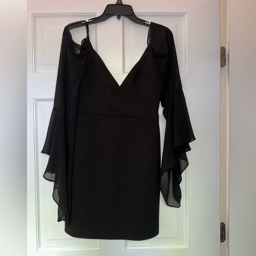 Beautiful black midi dress with shear sleeves.